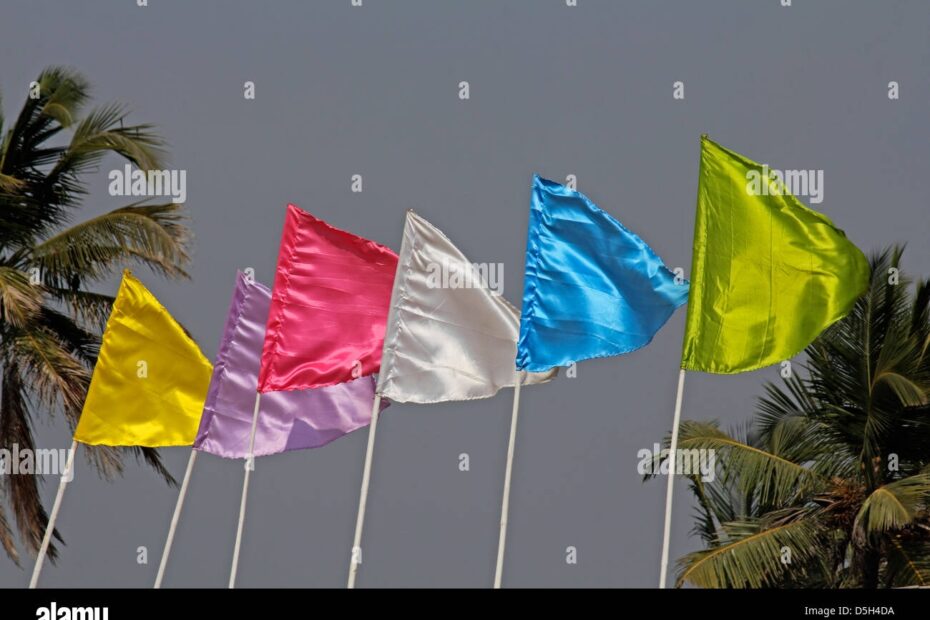 Colored Flags Flapping In The Wind On A Beach Stock Photo Alamy